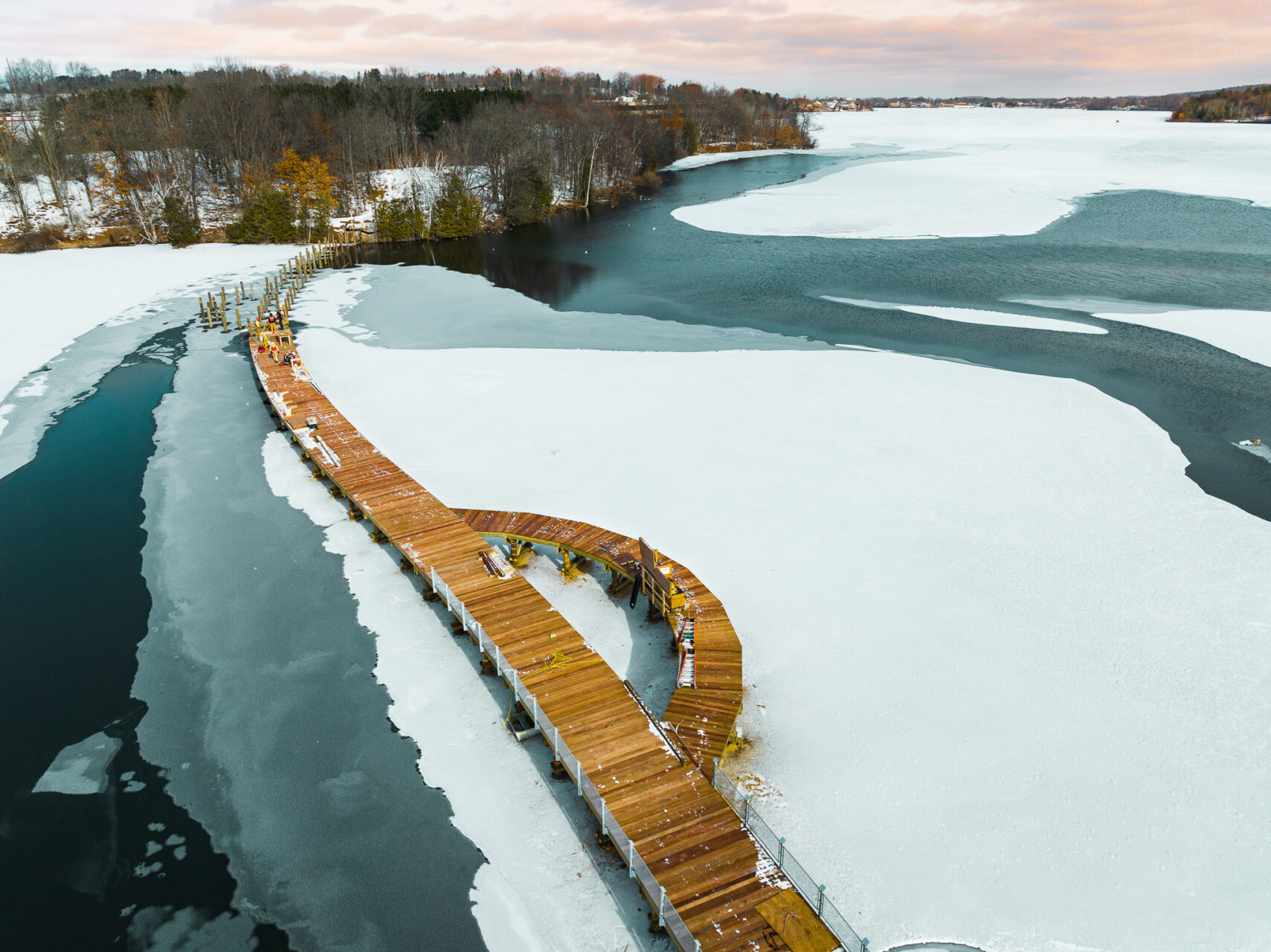 boardwalk across lake, winter