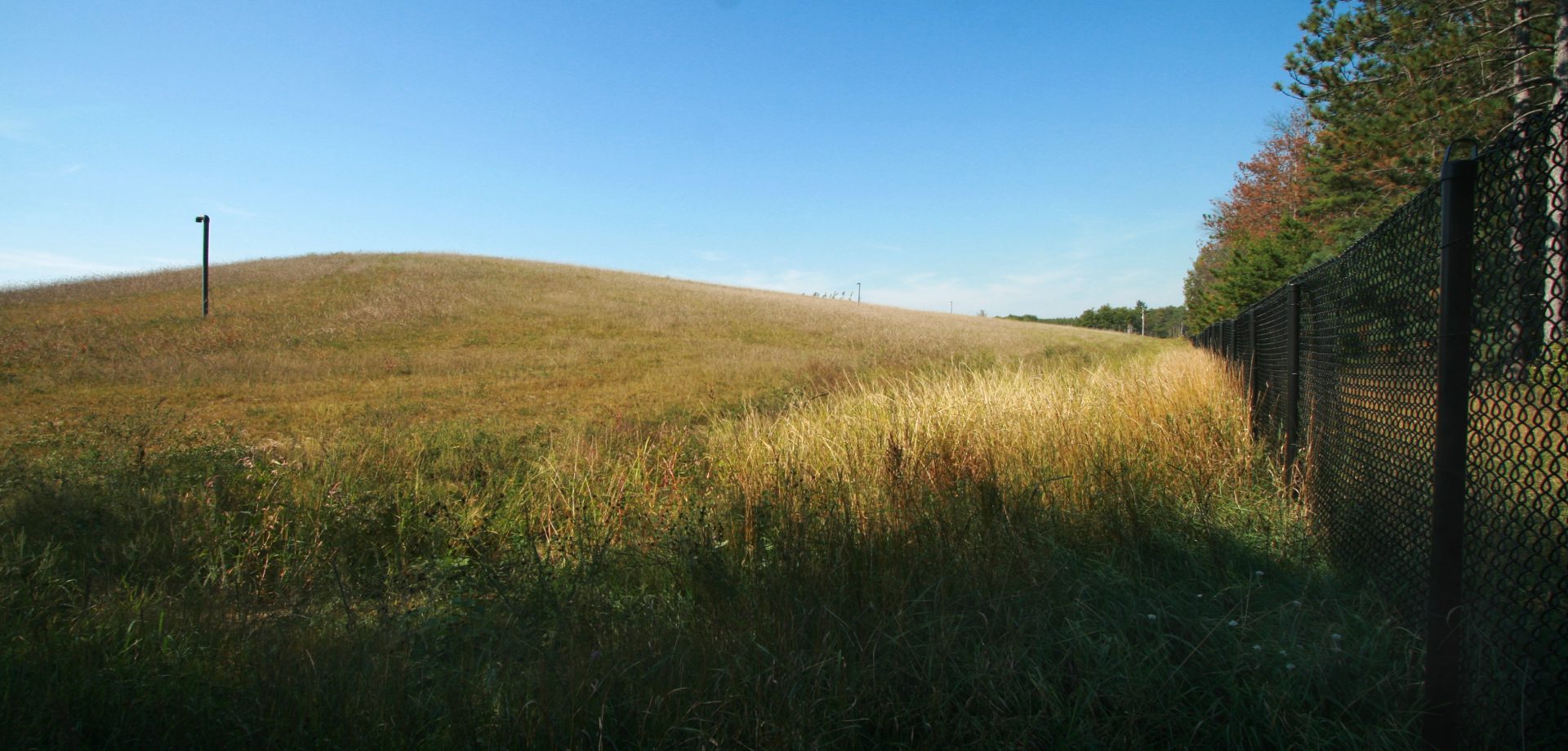 Field with hill, former landfill